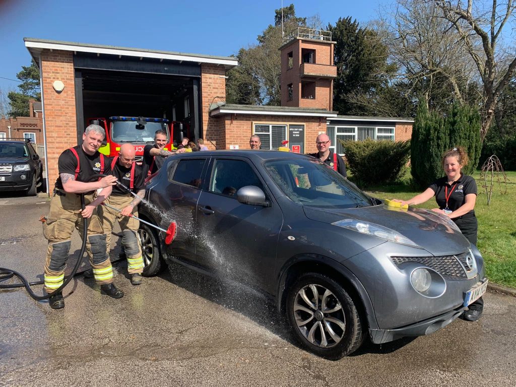Suffolk Firefighters Car washes cleans up for charity