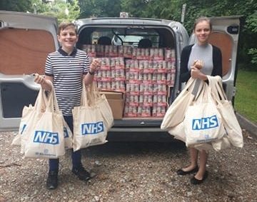Brother and Sister deliver goody bags to NHS Staff