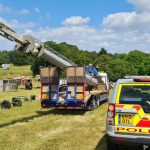 Lorry stopped by Police on A14 with mast hanging over the back by 7 metres