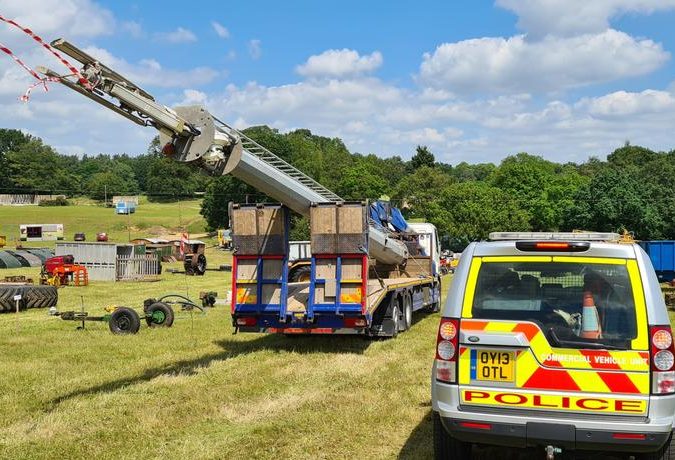 Lorry stopped by Police on A14 with mast hanging over the back by 7 metres